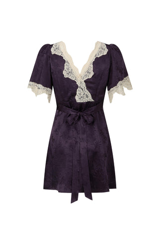 a-dark-purple-short-sleeve-mini-dress-with-cream-lace-trim-along-the-v-neckline-and-sleeve-cuffs-featuring-a-matching-fabric-tie-belt-at-the-waist